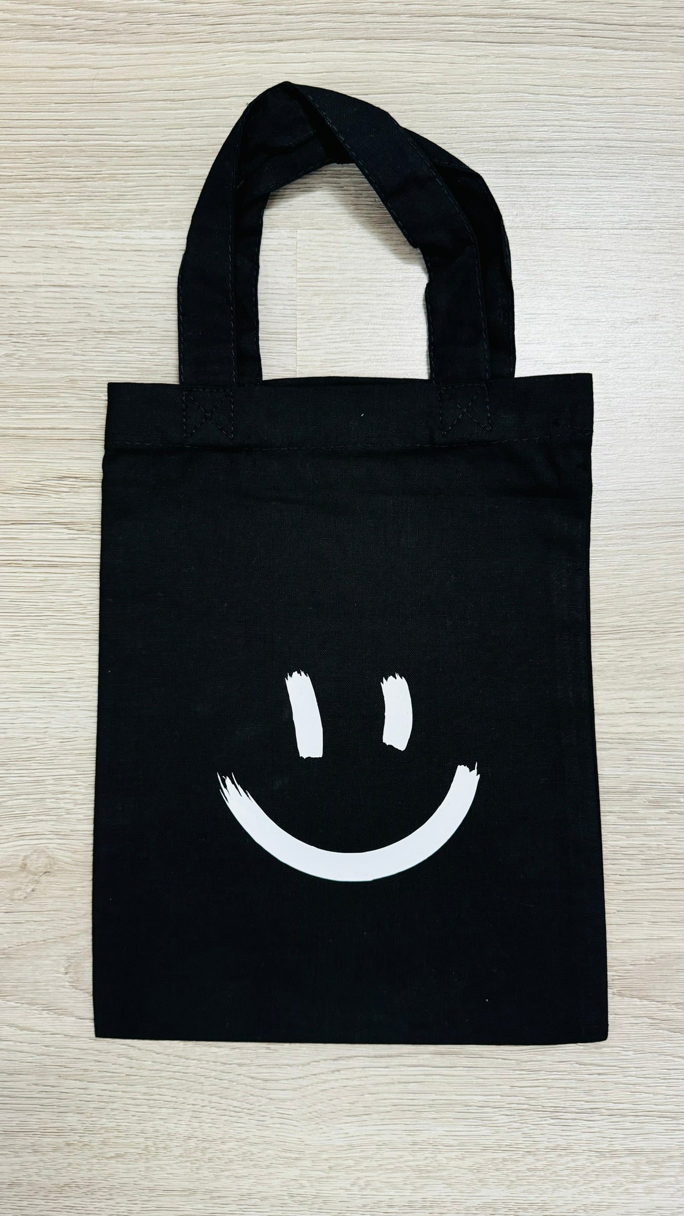 Tasje zwart smiley €3,99