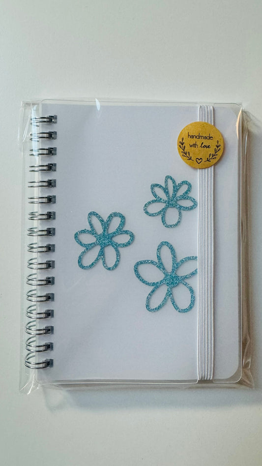 Notitieboekje bloemen (diverse kleuren) €1,49