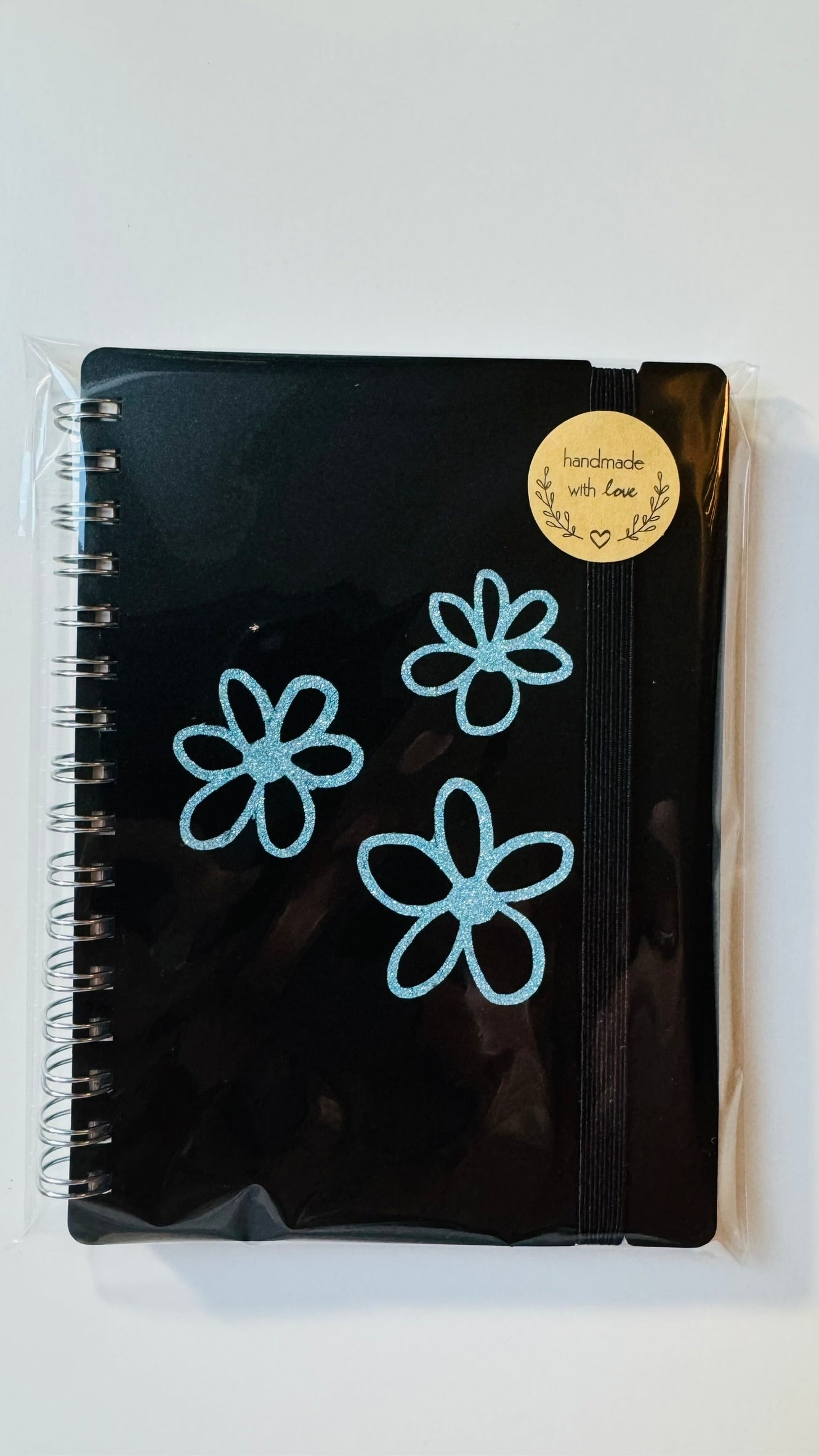 Notitieboekje bloemen (diverse kleuren) €1,49